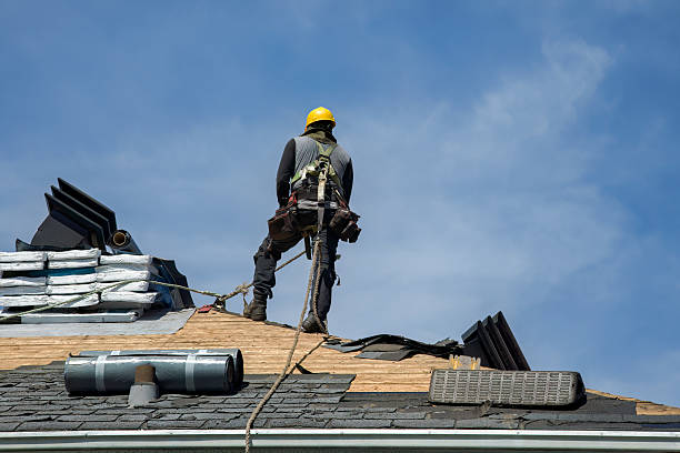 Professional Metal Roofing technician working in Lennon, MI